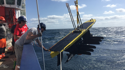 A WaveGlider is deployed off the research vessel Maria S. Merian.