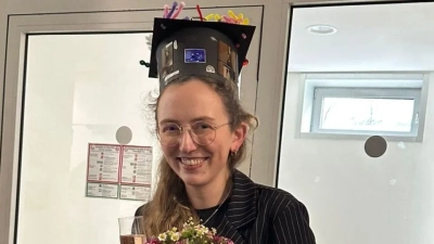 Bianca Thobor with her doctoral hat